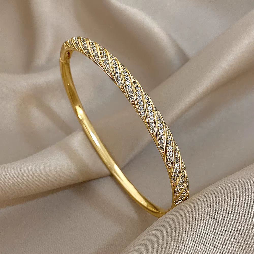 Bracelets de luxe torsadés en Micro incrusté de Zircon pour femmes, à la mode, en cuivre plaqué or, 