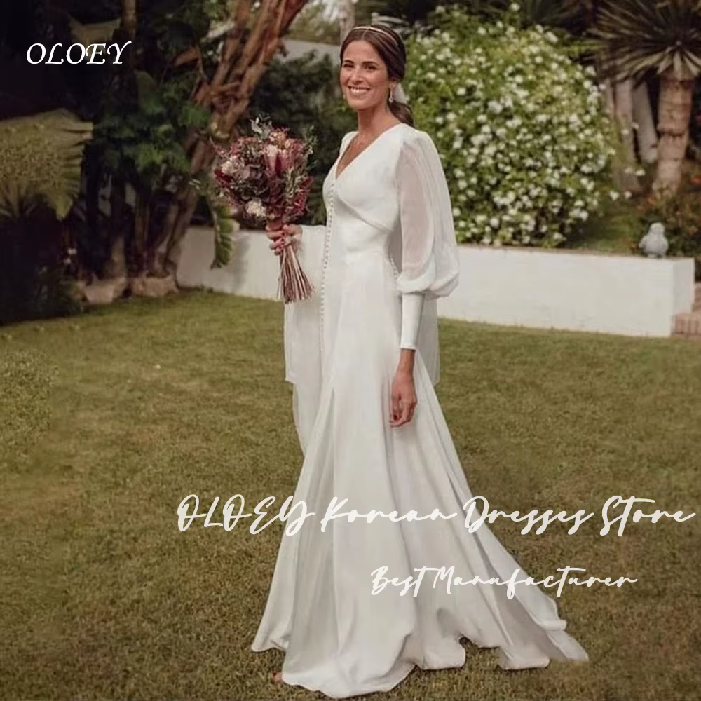 OLOEY Robe de mariée vintage ivoire, col en V, manches longues bouffantes, détails boutonnés, en mou