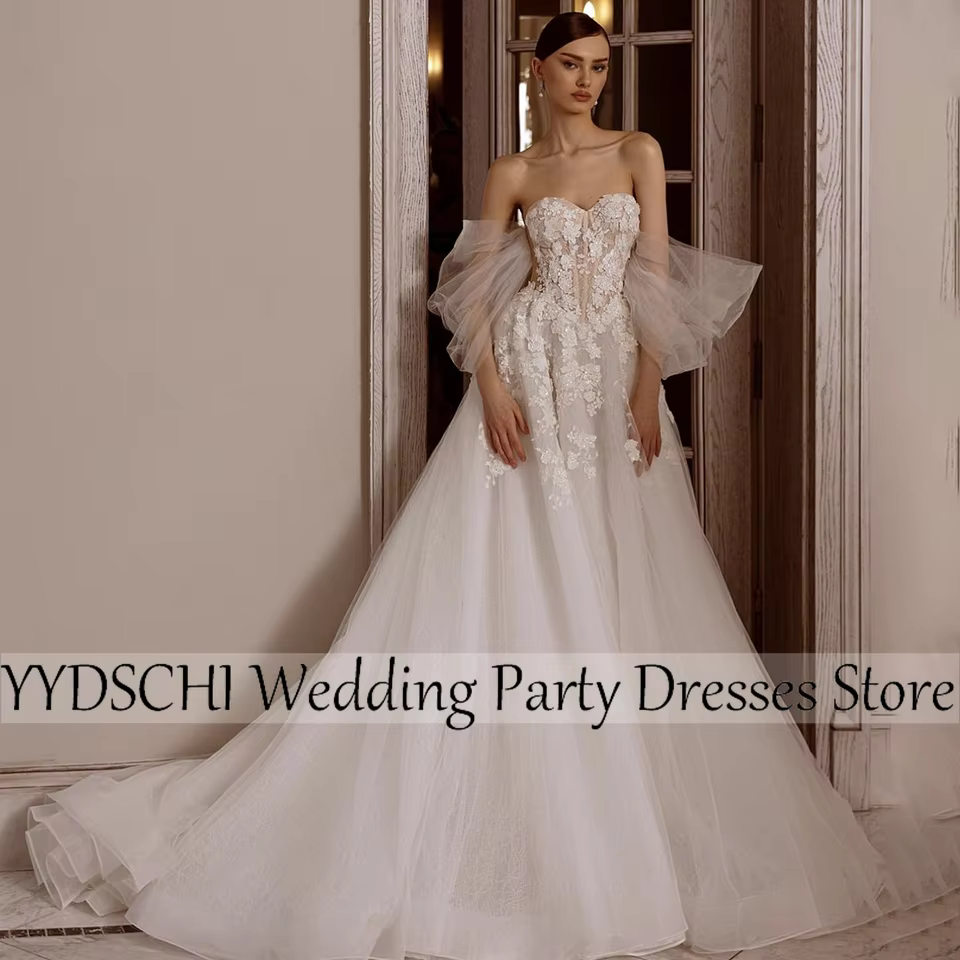 Robes de mariée 2026 Grande Taille Robe de mariée sexy avec appliques Robes de bal dos nu en cristal