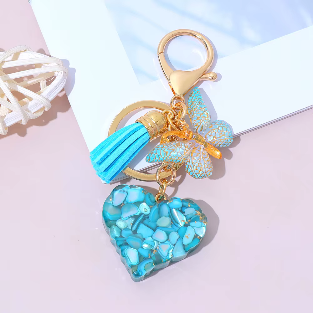 Porte-clés en forme de cœur en résine rempli de paillettes brillantes, pendentif bohème avec pompon 