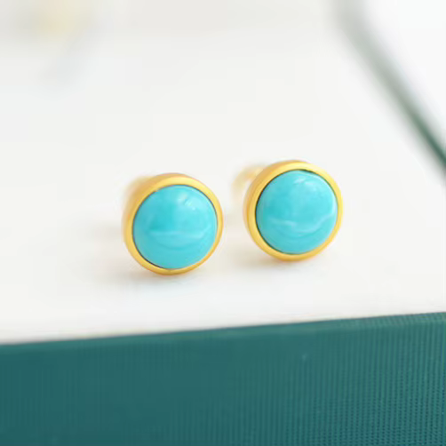 Boucles d'oreilles rondes turquoises incrustées en argent
