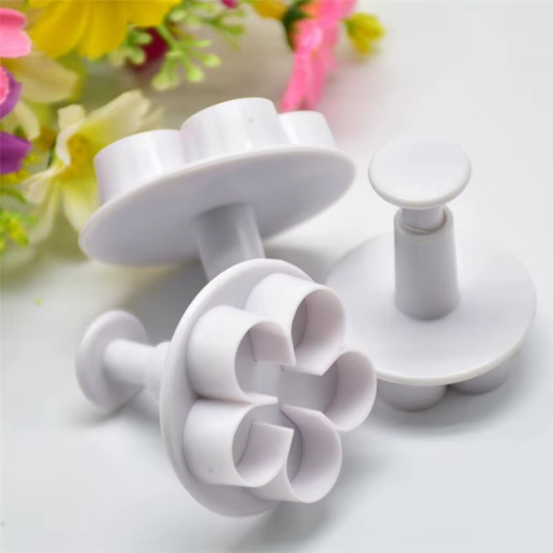Emporte-pièce à piston de fleurs