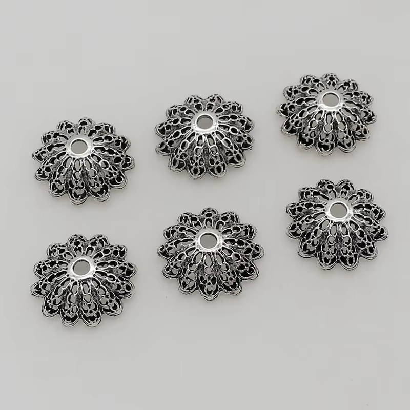 Capuchons à pompons en argent antique vintage