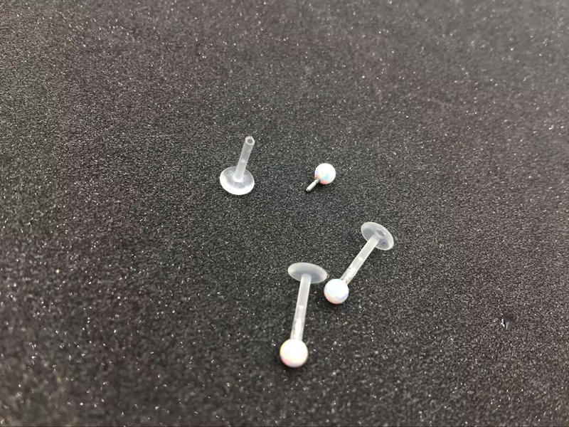 Retenues de piercing corporel