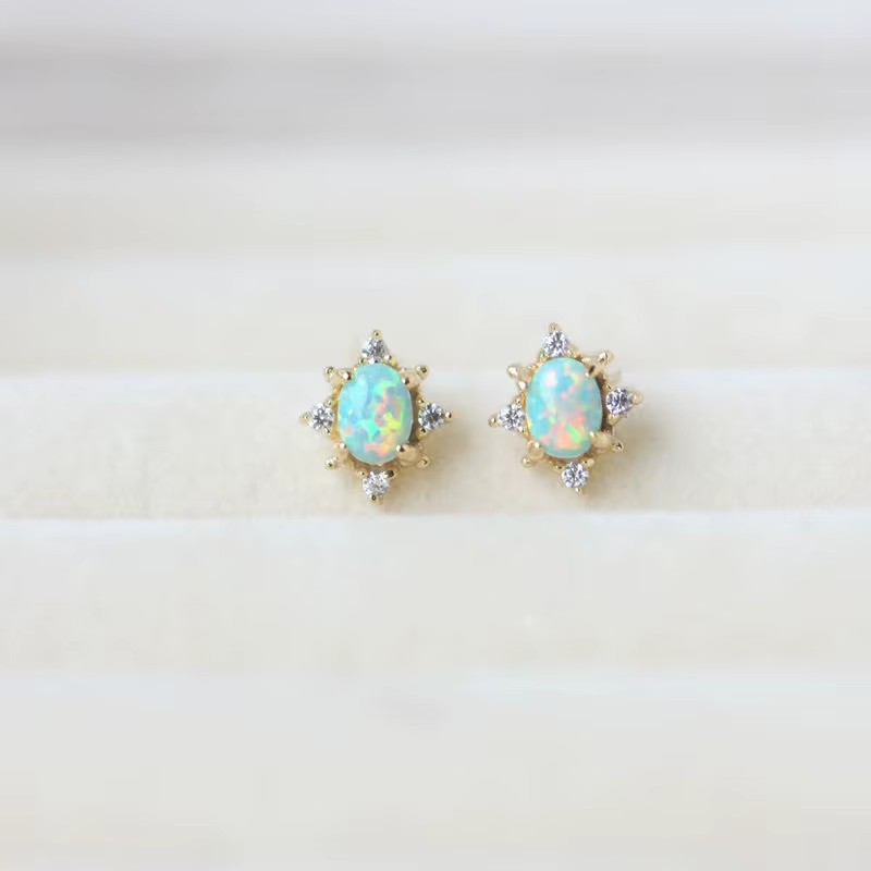Boucles d'oreilles ovales en opale artificielle