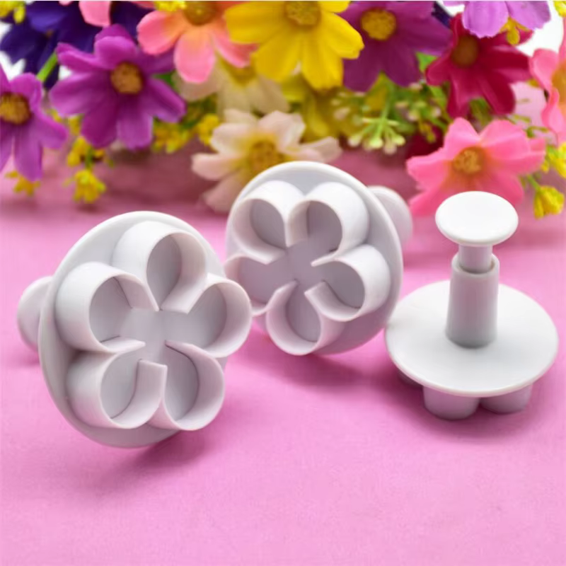 Emporte-pièce à piston de fleurs