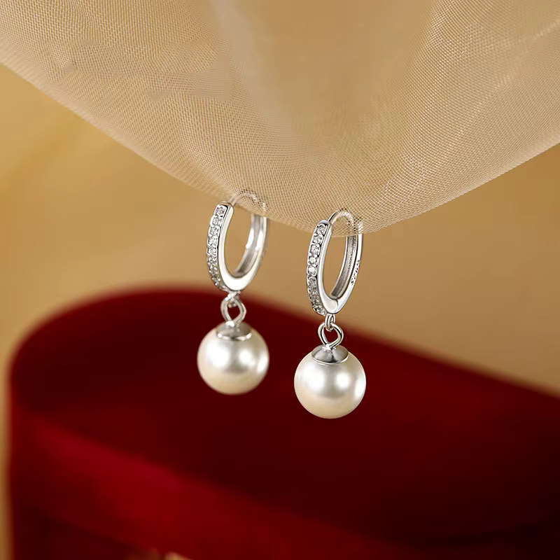 Boucles d'oreilles en perles brillantes