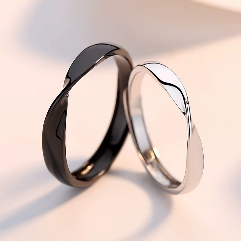 Nouveau Mobius Couple anneaux pour femmes hommes Simple noir blanc réglable