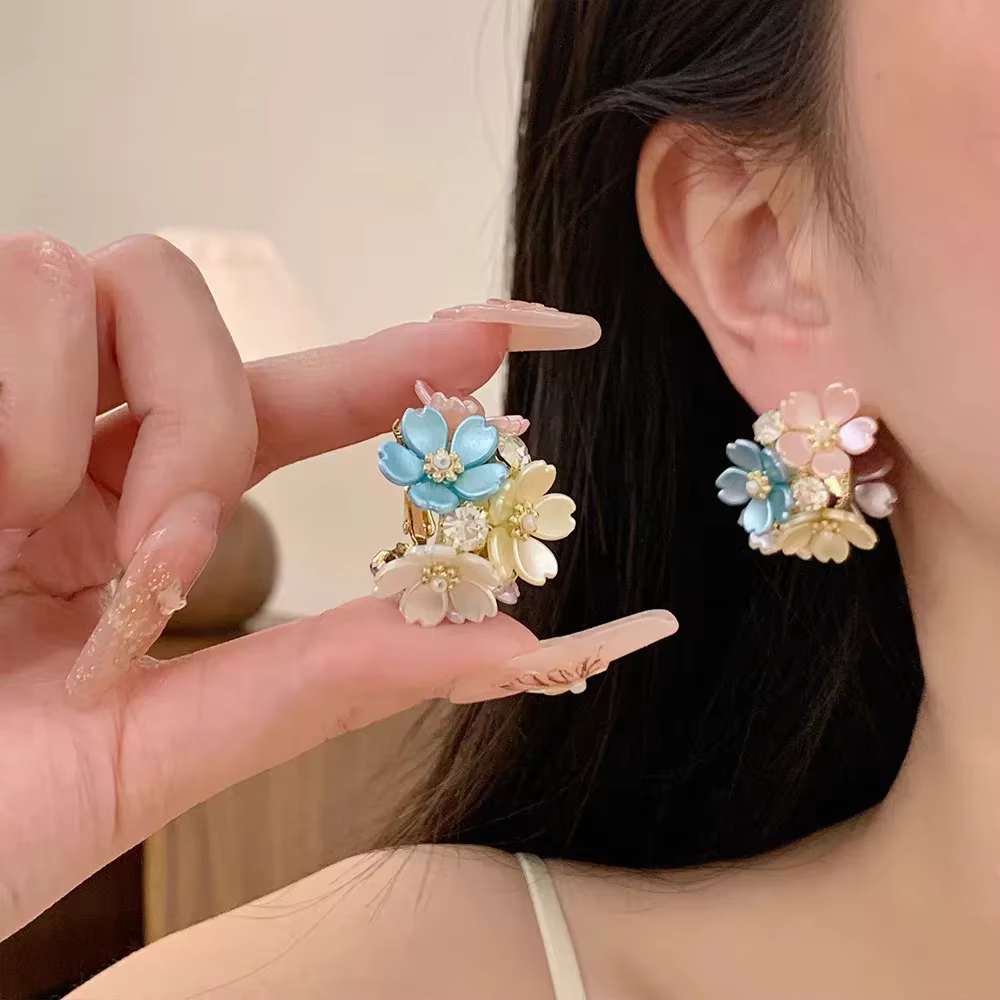 Boucles d'oreilles élégantes en perles et pétales