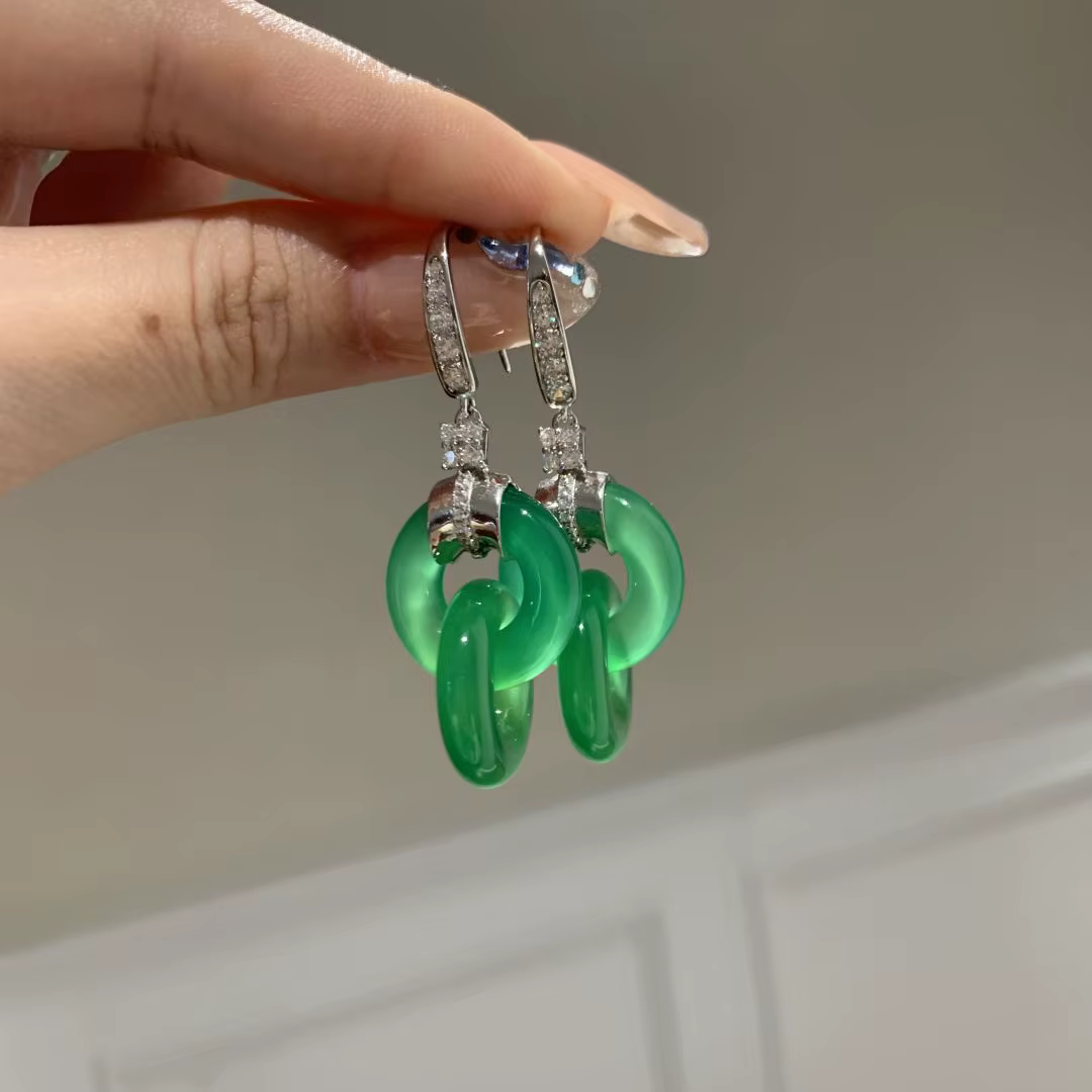 Boucles d'oreilles entrelacées fraîches en argent 925 incrusté de diamants