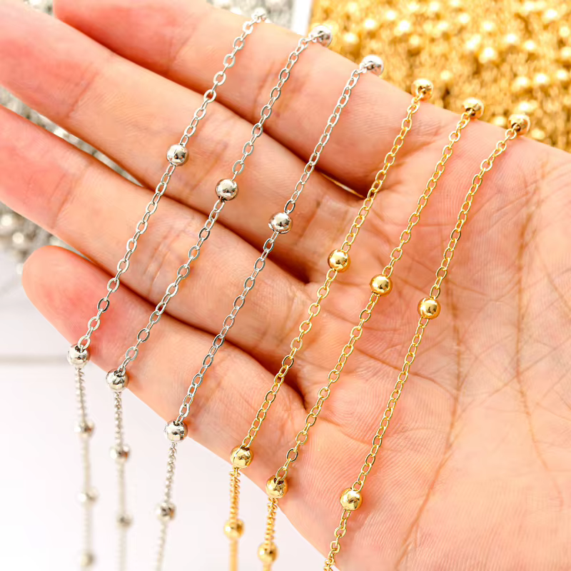 Chaîne de perles plaquées or KC et rhodium
