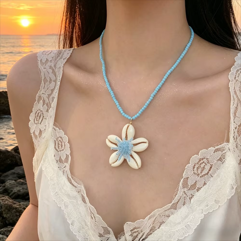 Collier de perles coquillages étoiles de mer style bord de mer pour femme