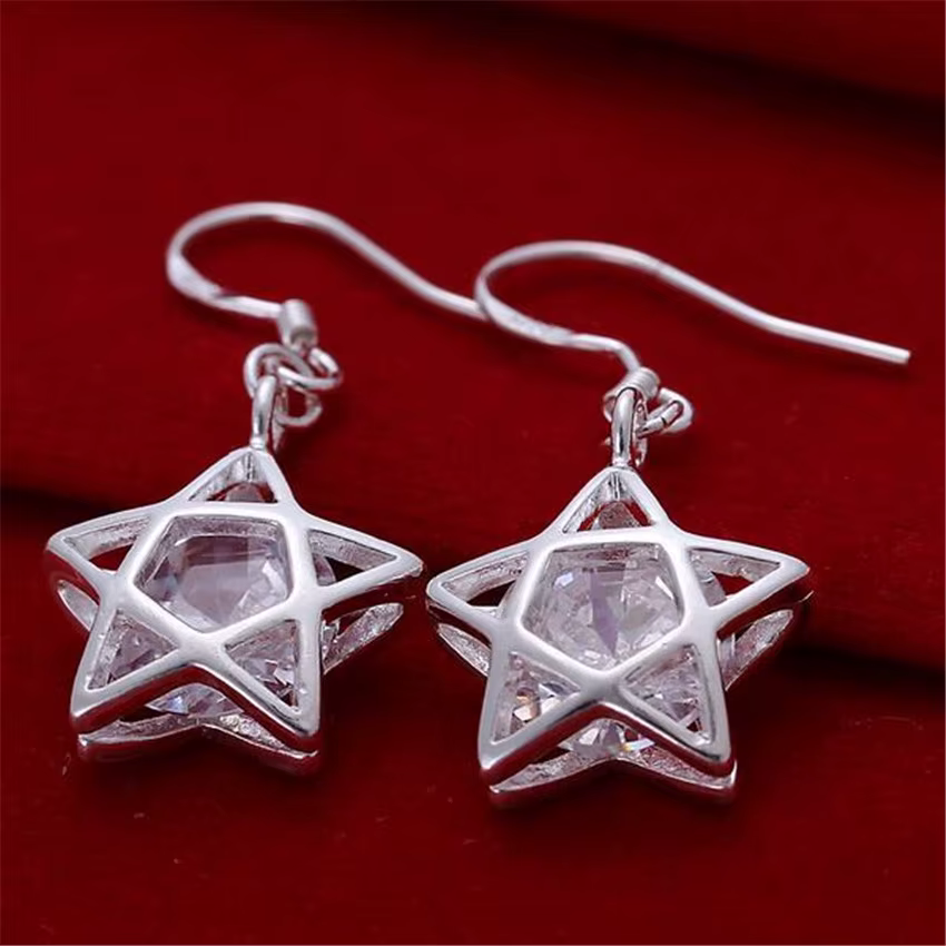 Boucles d'oreilles classiques en or 18 carats avec cristal en forme d'étoile pour femme