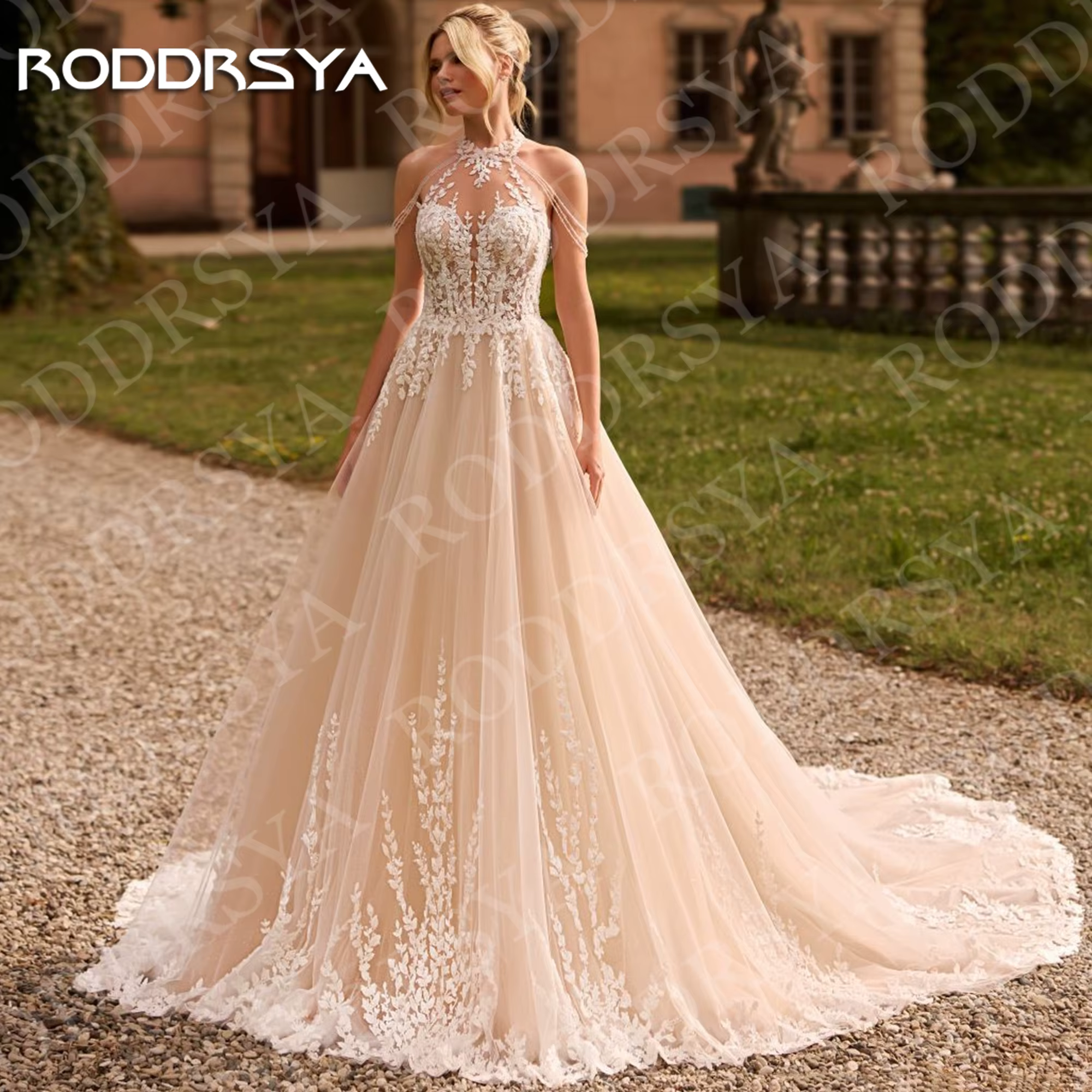 RODDRSYA Robe de mariée vintage bohème en tulle style A-line dos ouvert avec appliques en dentelle et col halter
