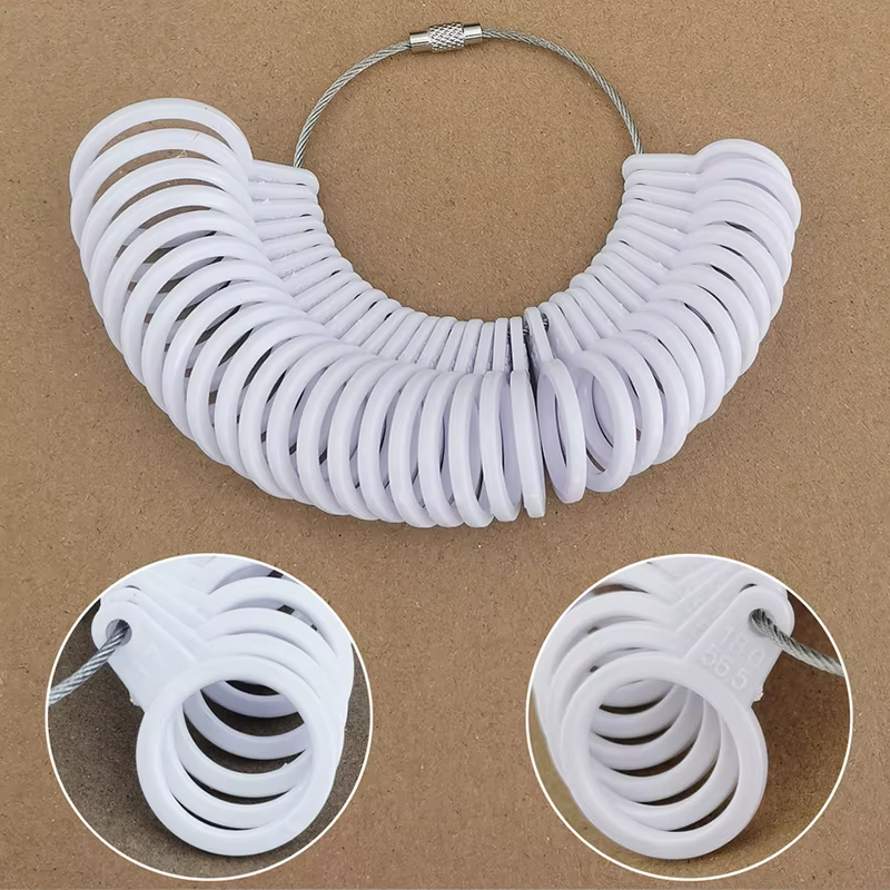 Outil de mesure de la taille des doigts des matiques en plastique