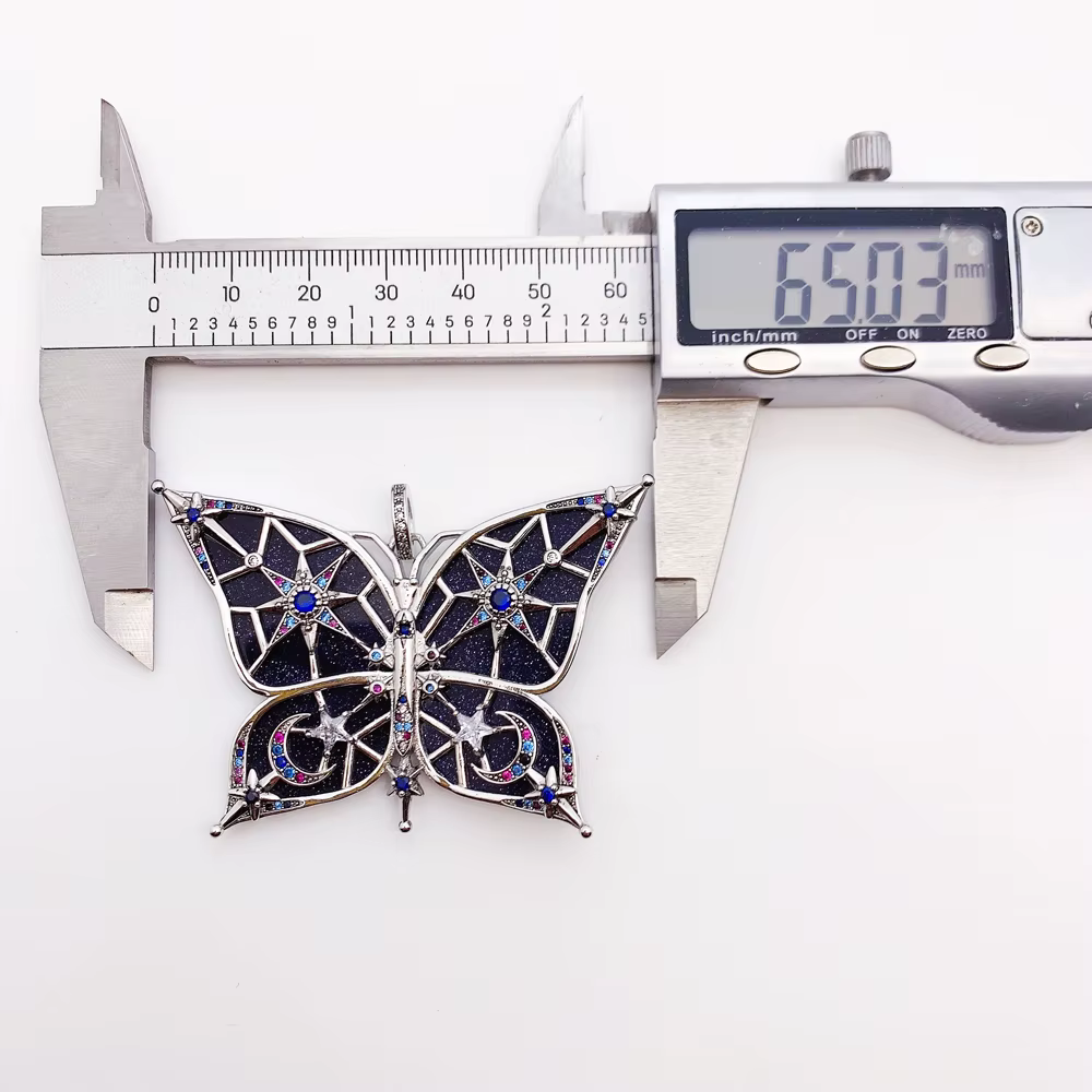 Pendentif papillon étoile et lune de rêve