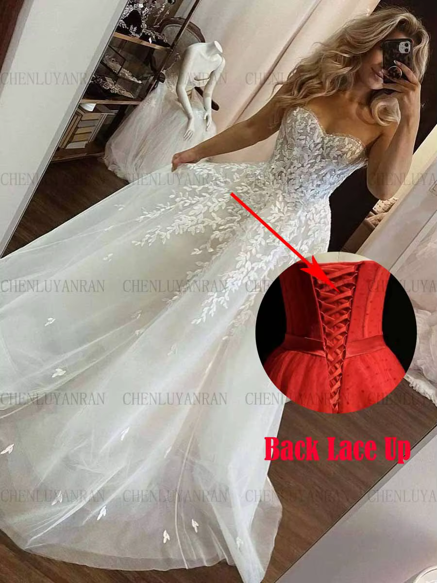 Robes de mariée longues sans bretelles pour femmes