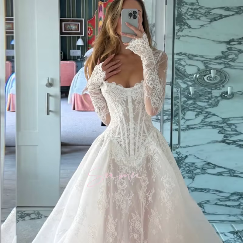 Robes de mariée personnalisées dentelle élégante à manches longues a-ligne bouton Boho
