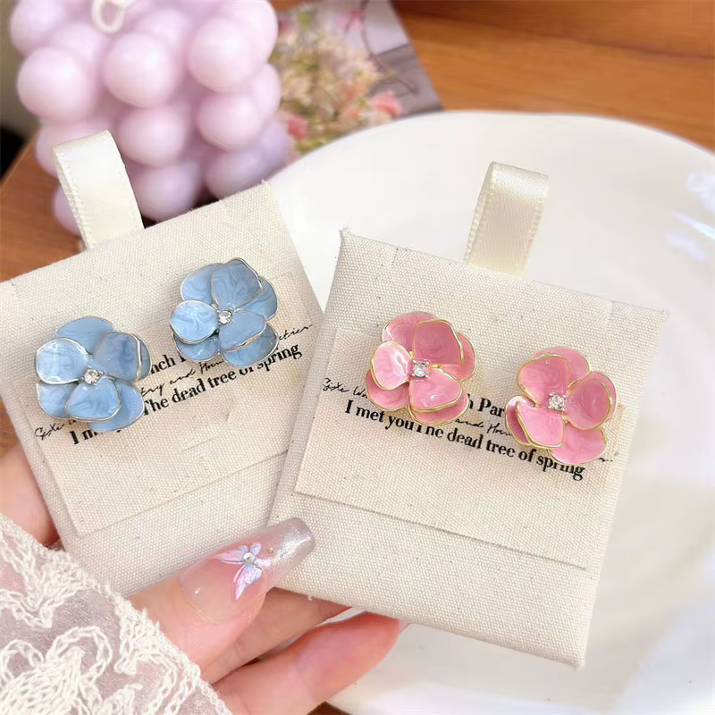 Boucles d'oreilles en émail bleu rose
