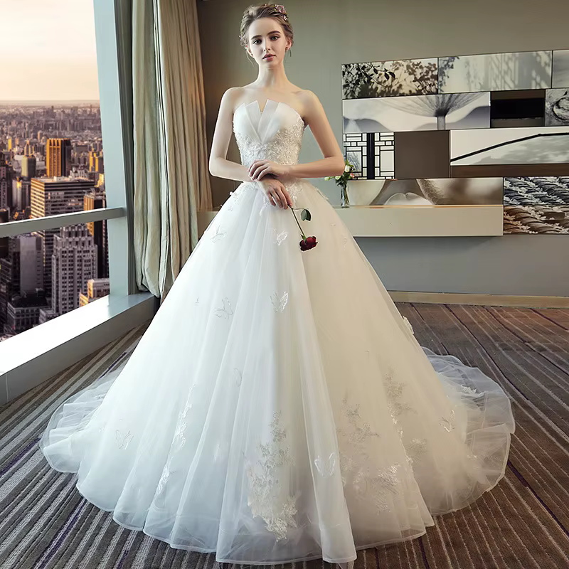 Robe de mariée traînante 2026