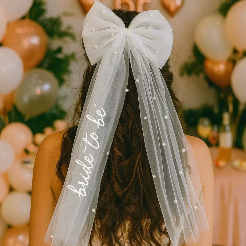 Voile de mariée avec nœud et perles