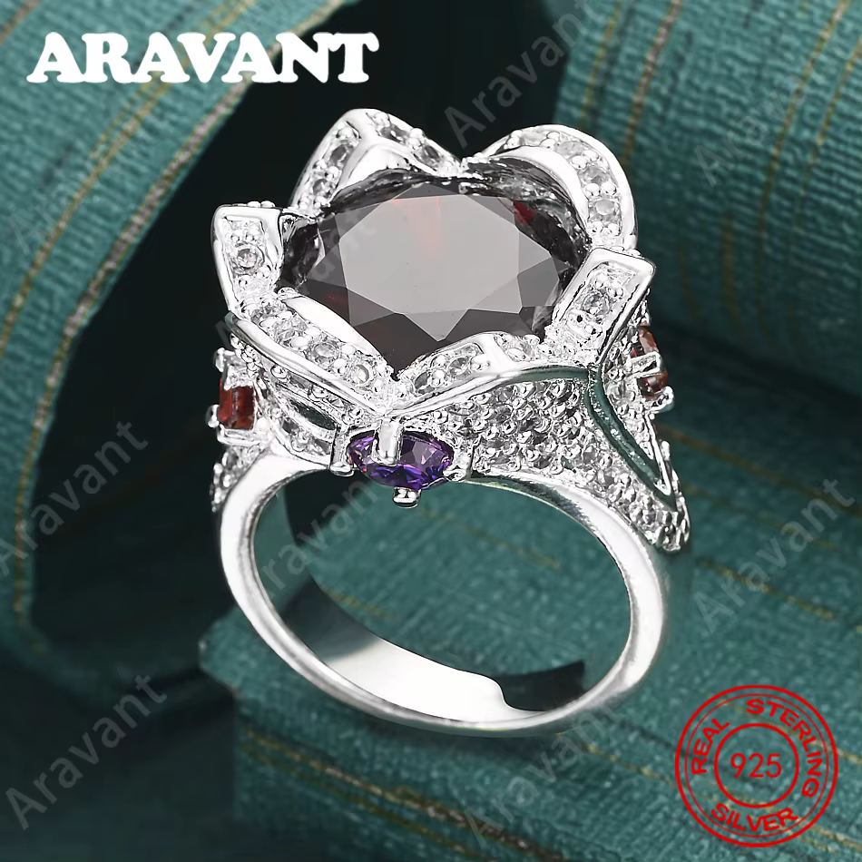 Bague en argent sterling 925 avec zircon rouge à trois faces : un bijou de fiançailles frais et élégant pour femme.