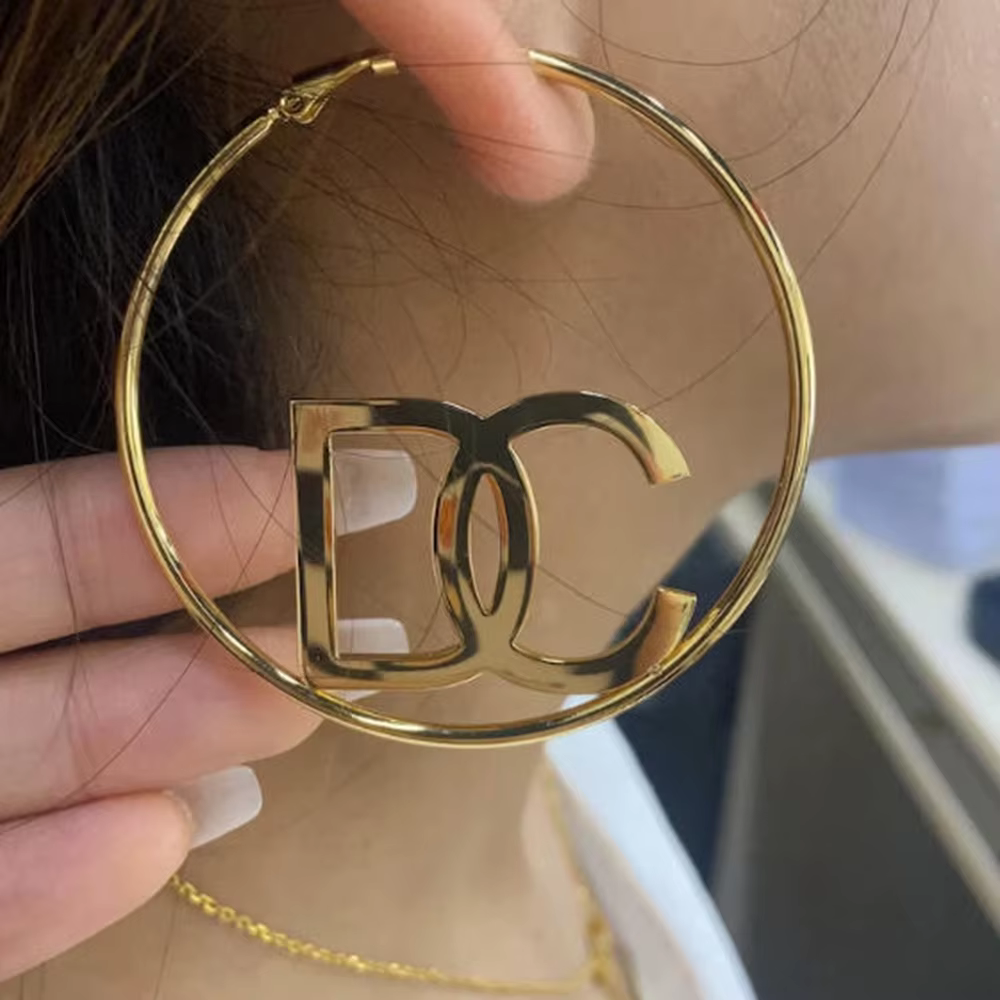Boucles d'oreilles en forme de lettre