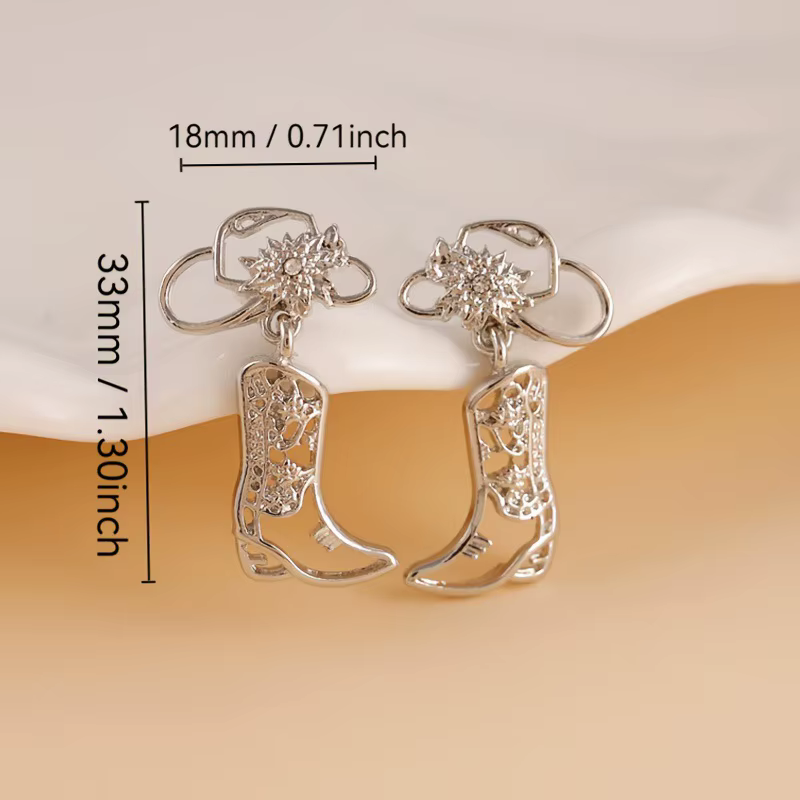 Boucles d'oreilles pendantes tendance en forme de botte de cowboy évidée pour femme
