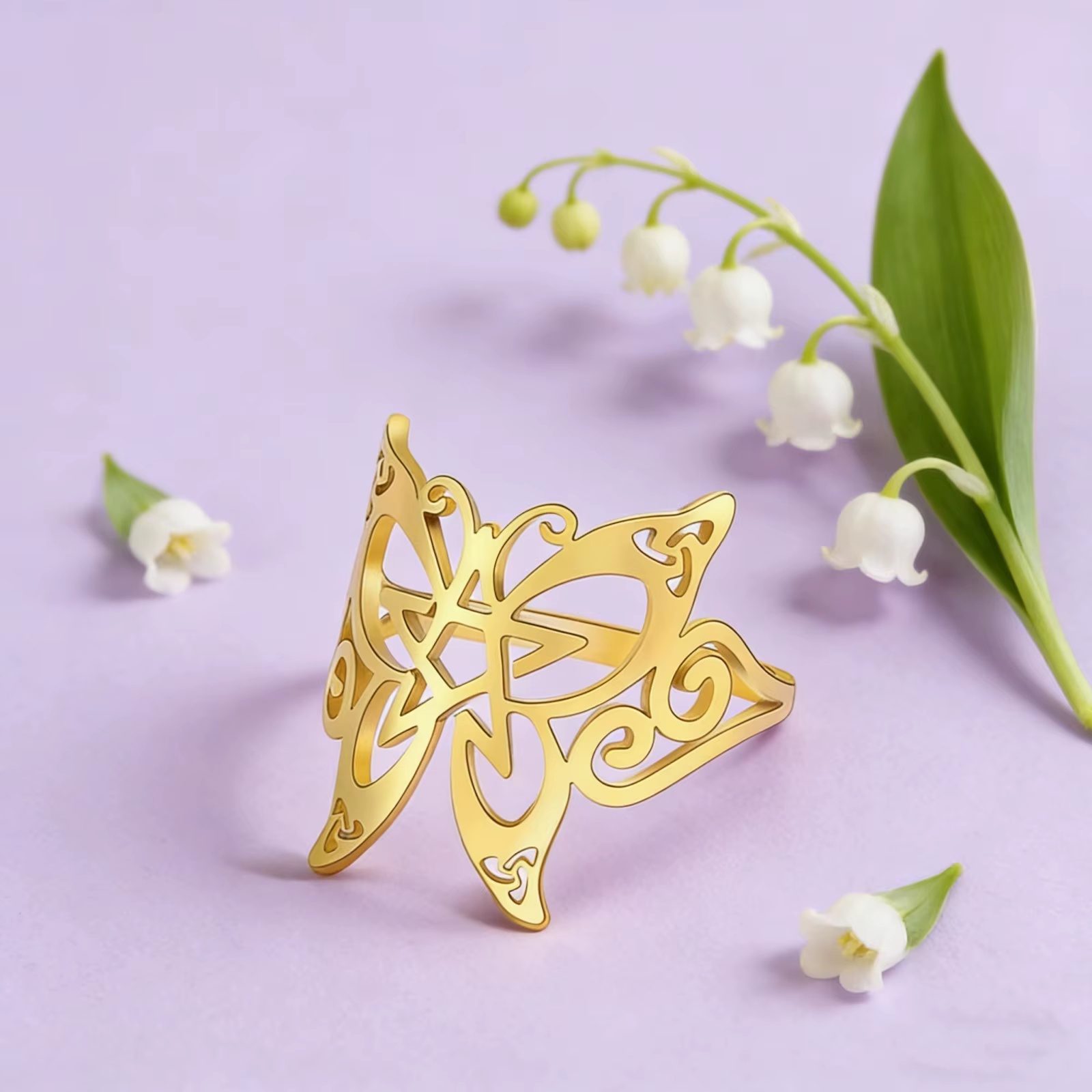 Bague papillon, amulette pentacle