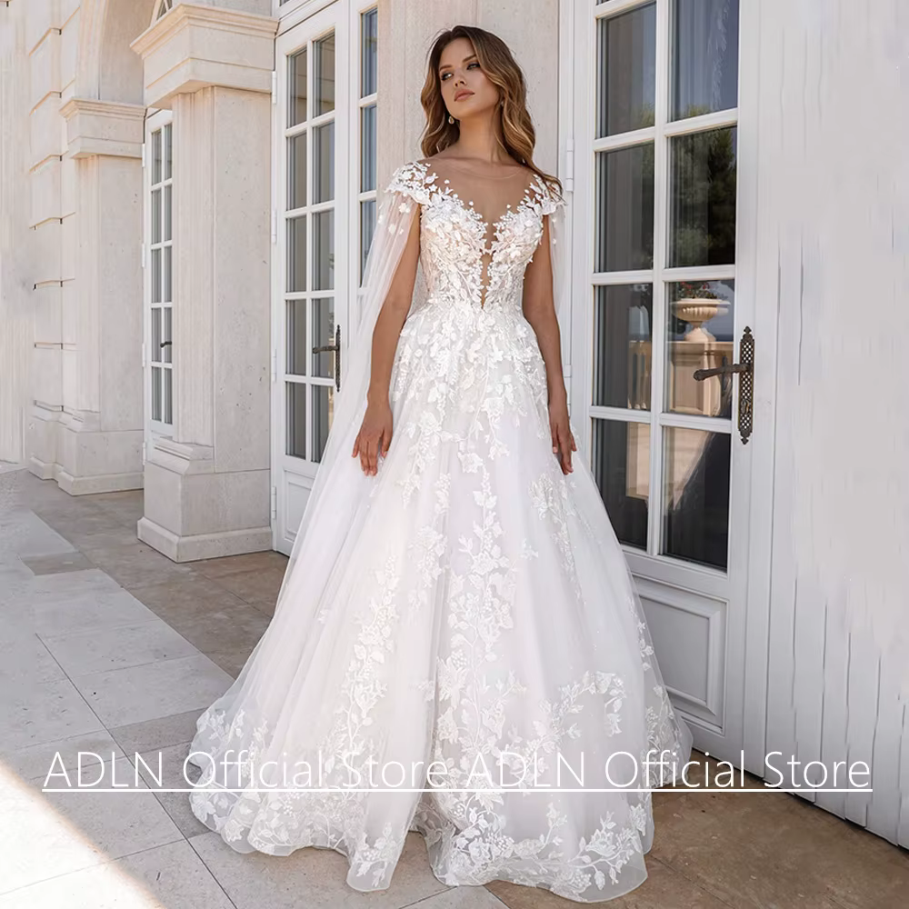 Robe de mariée avec cape à manches personnalisées