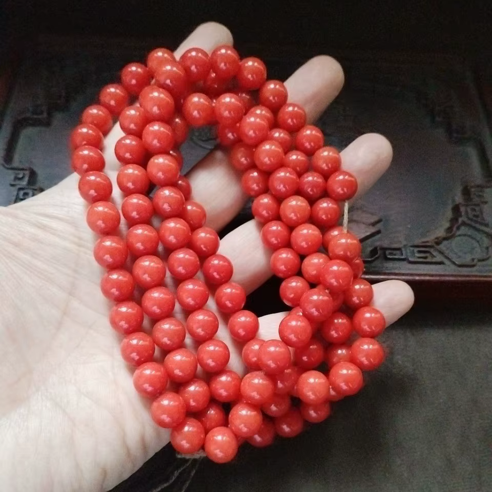 Perles rondes lisses en corail rouge vif