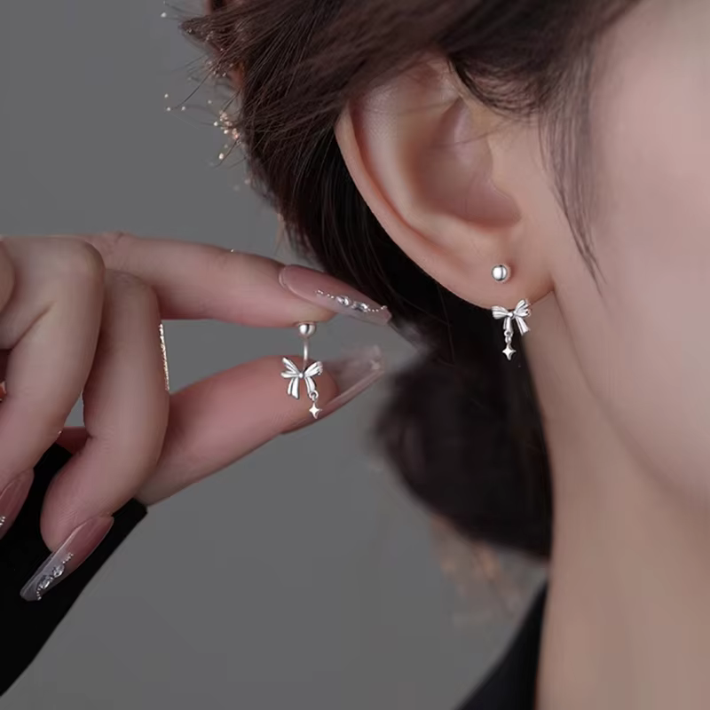 Boucles d'oreilles à visser avec nœud papillon et perles couleur argent pour femmes