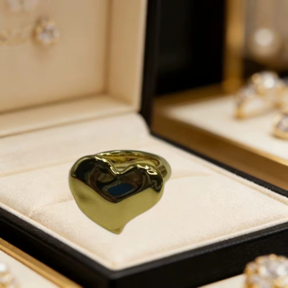 Bague en forme de cœur or et argent