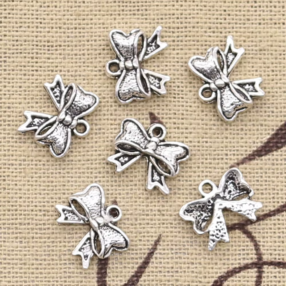 50 pièces breloques nœud papillon 11x10mm Antique Bronze argent couleur pendentifs bricolage collier faisant des résultats à la main bijoux tibétains