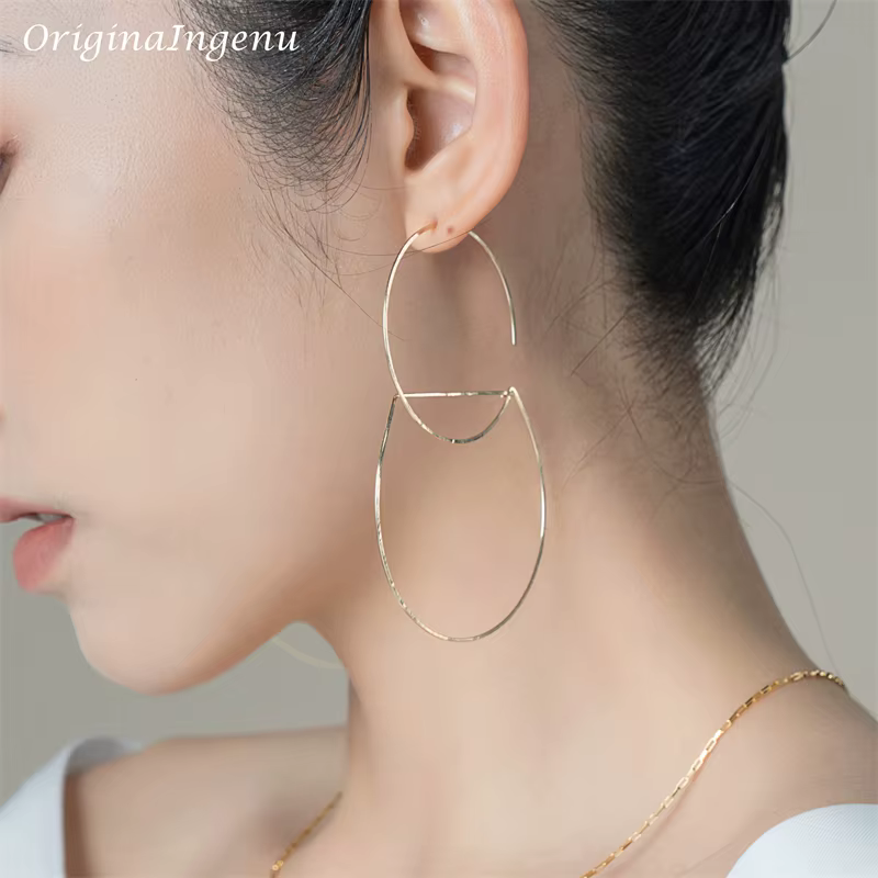 Boucles d'oreilles en forme de cerceau rempli d'or