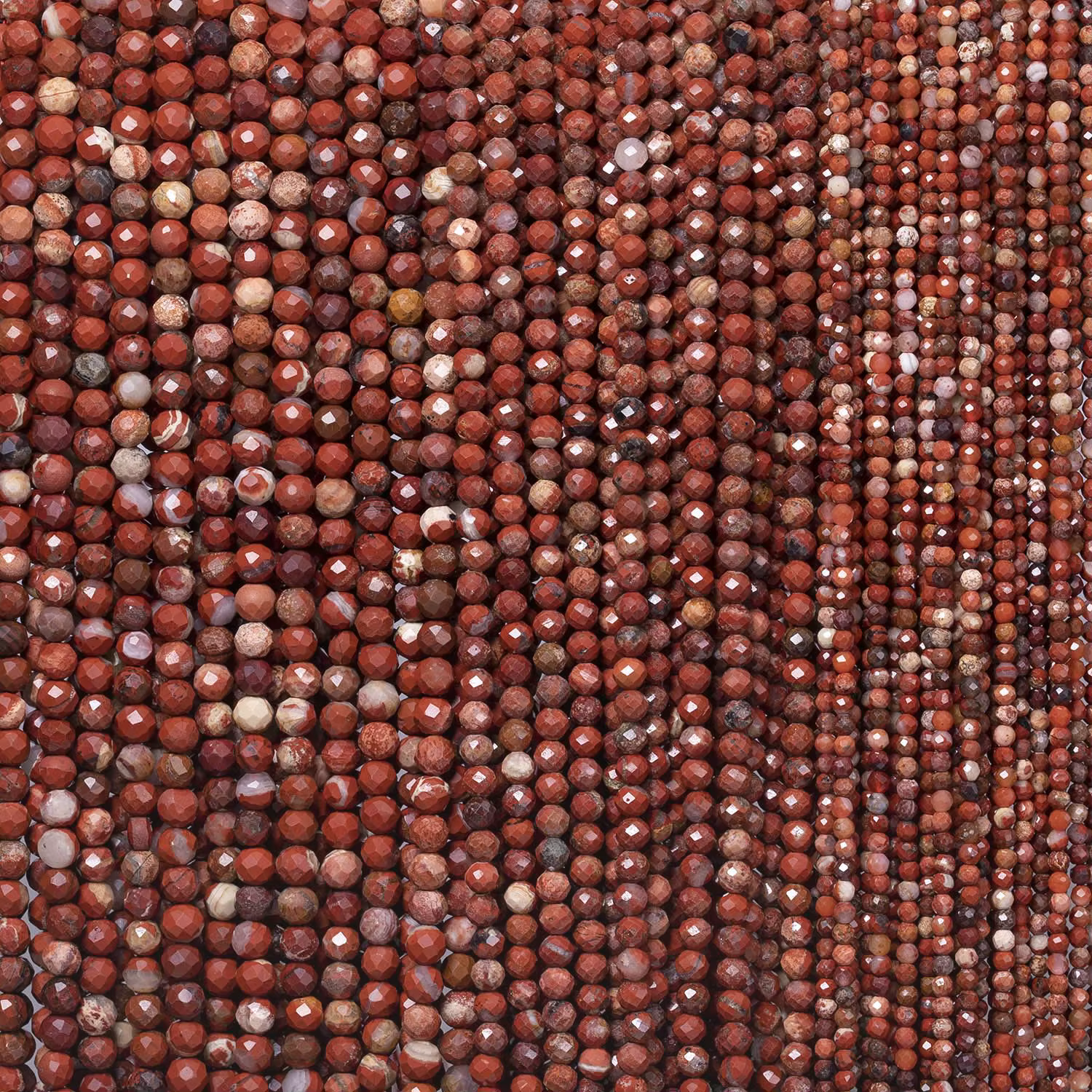Perles minérales en jaspe rouge à facettes naturelles