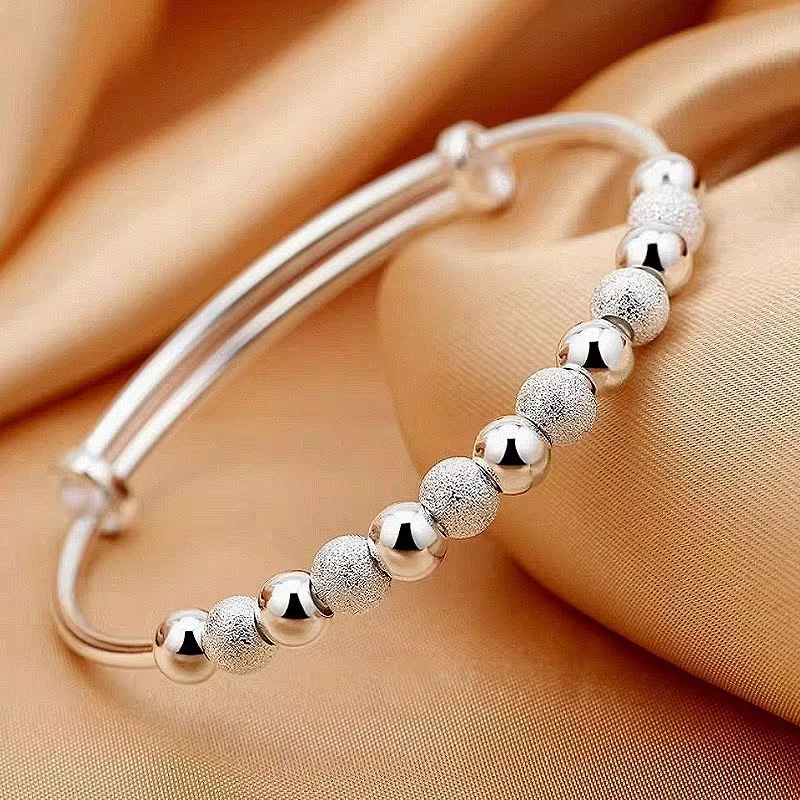 Bracelets et Joncs de Luxe en Or 18K avec Breloques et Perles