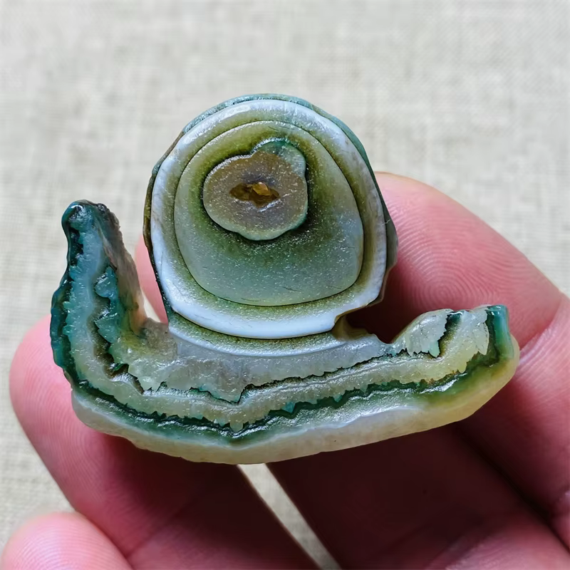 Œil d'Horus égyptien ancien en agate naturelle