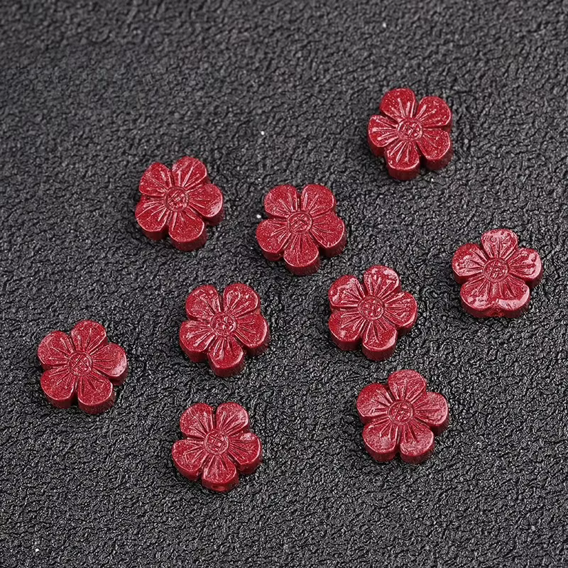 Cinabre gravé fleur de prunier à cinq pétales