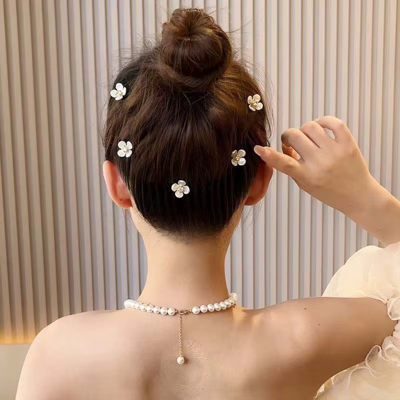 Anneau de cheveux de décor de fleur de biscuits pour des femmes