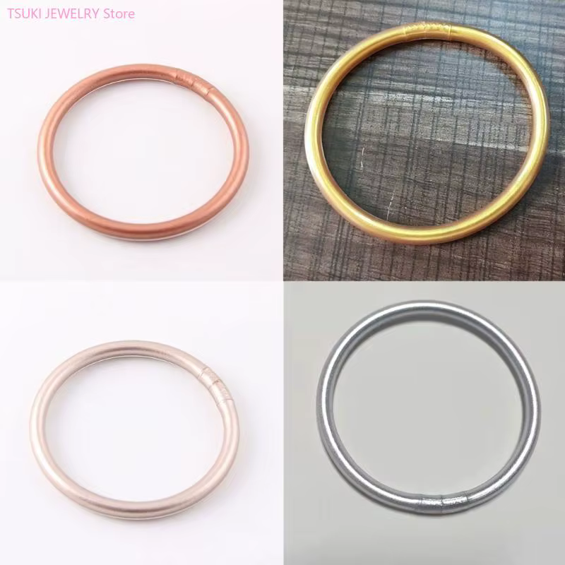 62KE – Bracelet gelée en plastique rempli feuille d'or clair