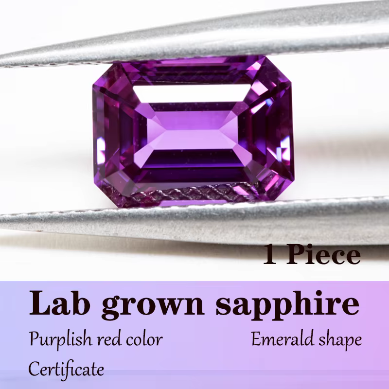 Saphir de laboratoire de couleur rouge violacé en forme d'émeraude