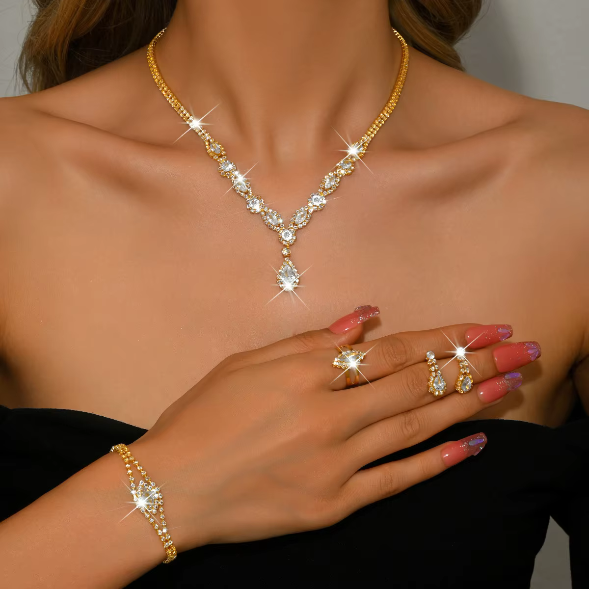 Parure de bijoux de mariée élégante en cristal transparent