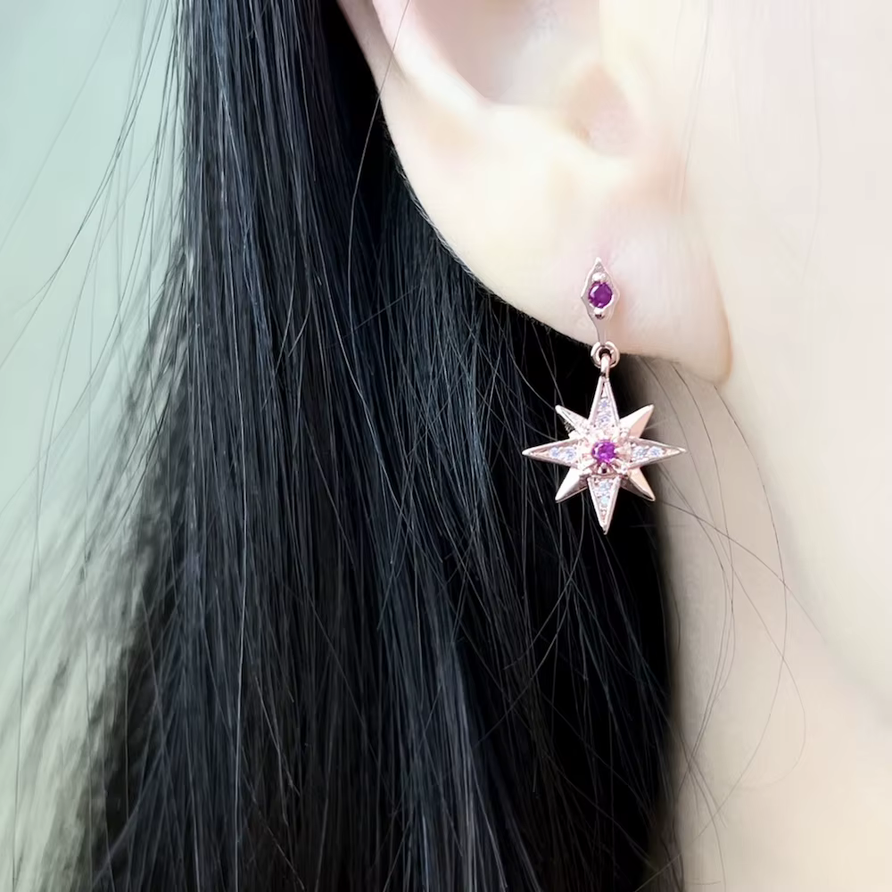 Boucles d'oreilles délicates étoile magique rose