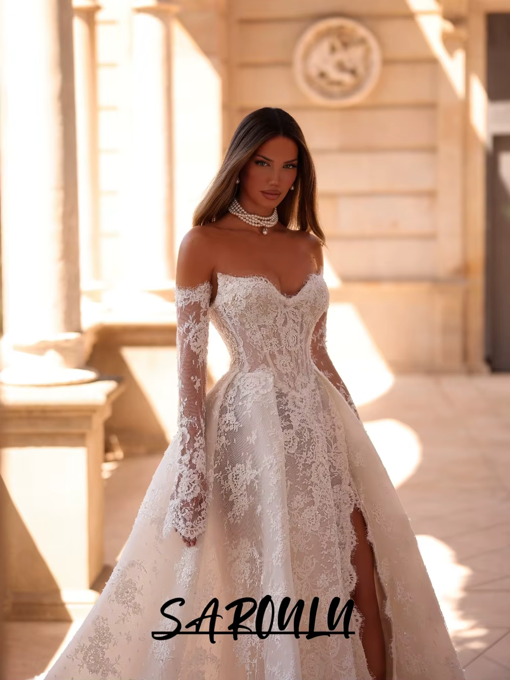 Robe de mariée en dentelle perlée complexe