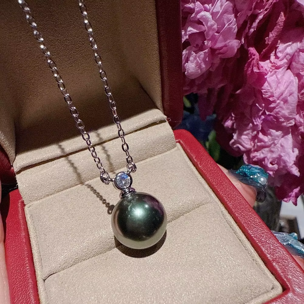 Ensemble de bijoux en perles de coquillage vert paon et pierres scintillantes