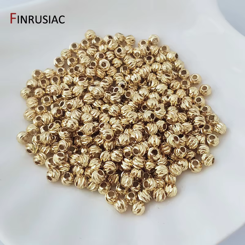 Perles de fleurs coupées à rayures plaquées or 18 carats