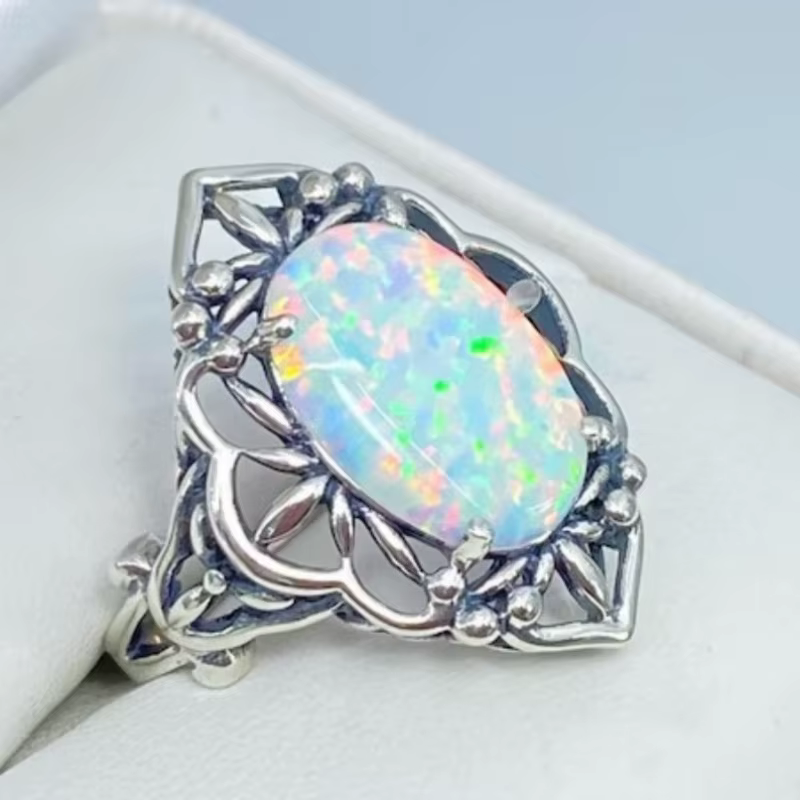 Bague vintage pour femme incrustée de faux opale