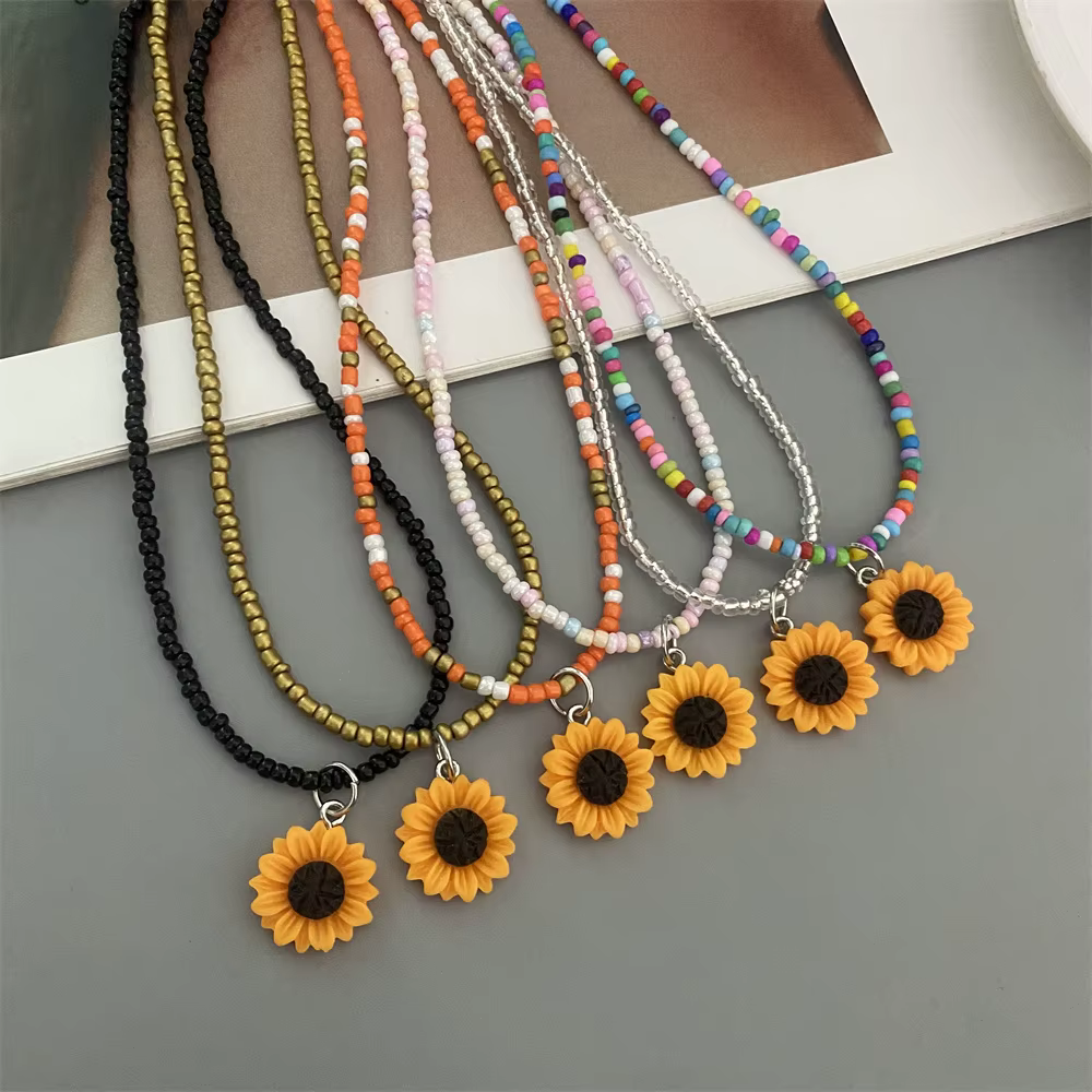 Collier ras du cou court en perles de rocaille colorées, avec pendentif fleur jaune, collier cadeau, perles de riz de couleur noir Orange, bijoux cadeaux